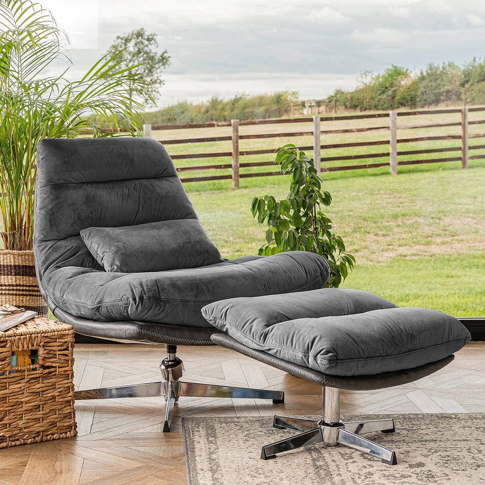 Grey arm chair with foot stool sale